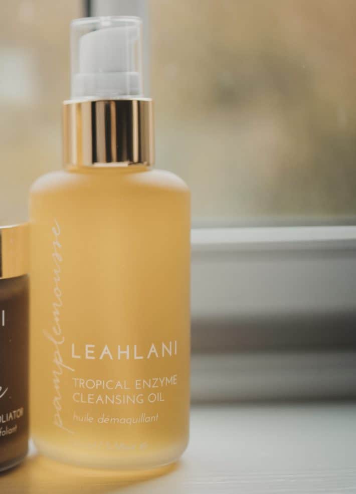 Leahlani's pamplemousse cleaning oil sits on a window sill.