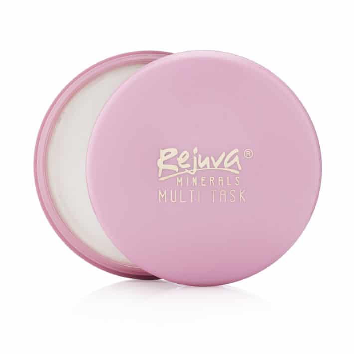 a pink compact with white finishing powder showing