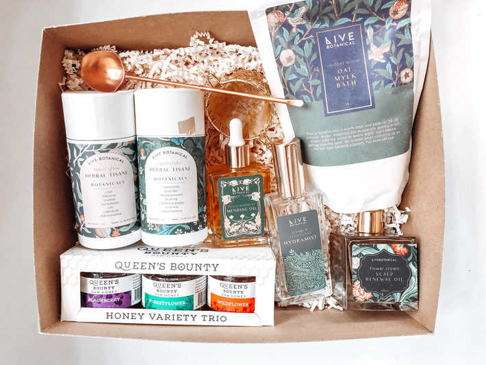 Box with skincare gifts from Live Botanical