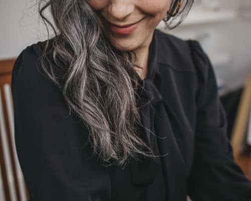 woman with wavy gray hair