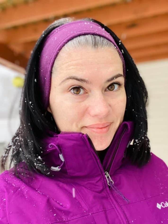 Woman wearing winter head band. gray hair