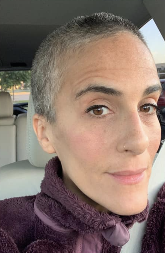 woman with gray hair and shaved hair