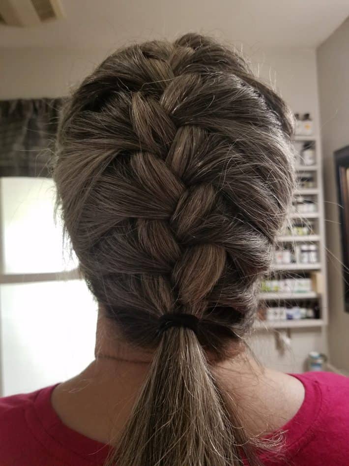 woman with gray hair braid
