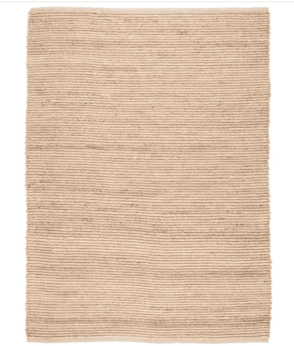 a jute rug in a tan color