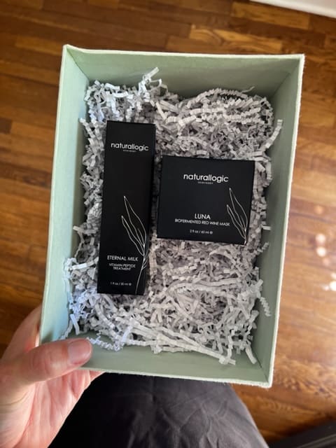 The June subscription box from Boxwalla with two products in black boxes 