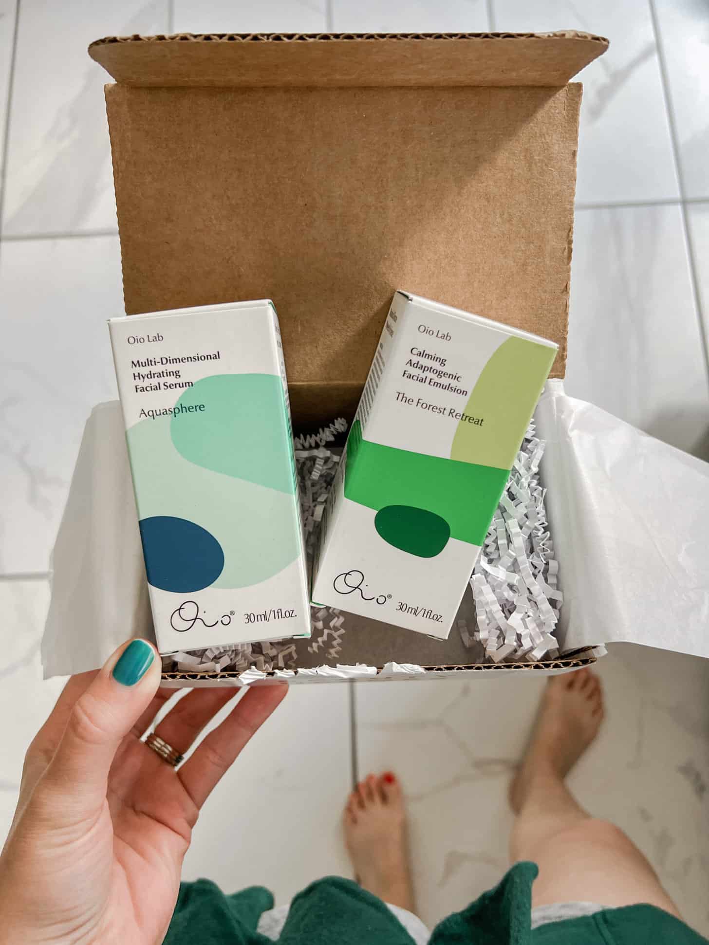 the july beauty heroes subscription box with two products from Oio Lab