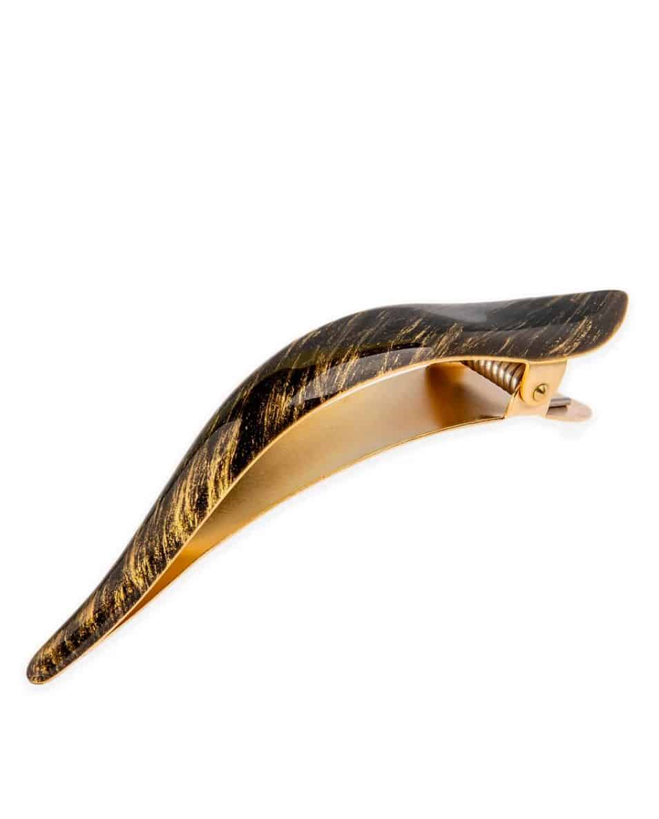 a gold and tortoise hair clip