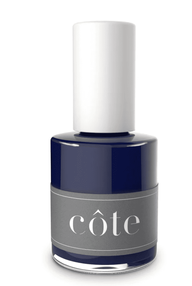 a bottle of cote nail polish in shade no. 77 (a dark navy blue)