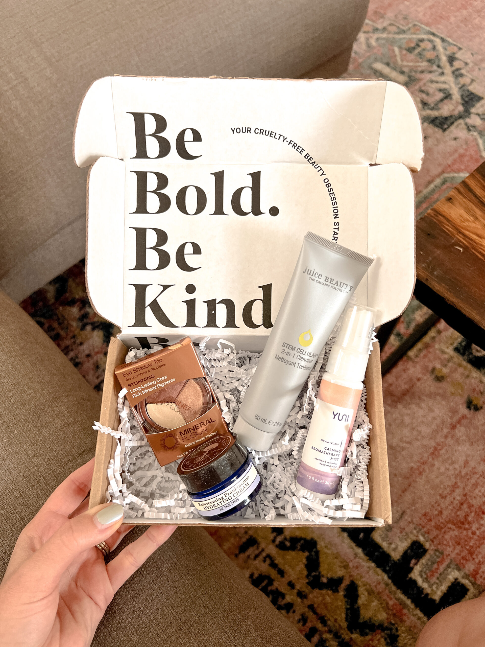the september beauty box by petit vour featuring four beauty products
